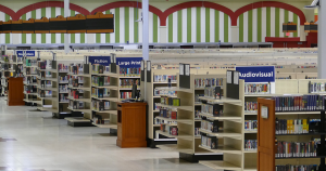 Interior of the Merchants' Square Main Library, temporarily housed in an old grocery store