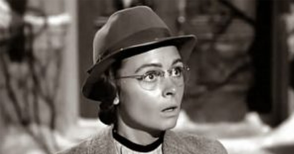 Still from It's a Wonderful Life featuting Mary as a librarian