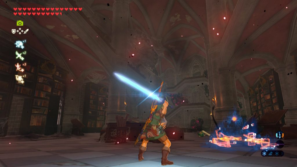 Link charges the Master Sword for battle in the Hyrule Castle Library in The Legend of Zelda: Breath of the Wild. Screenshot by Chase Ollis / Nintendo.