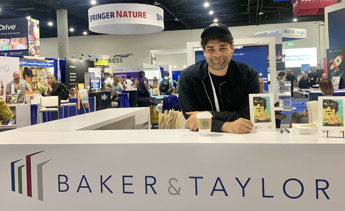 Raj Tawney at the Baker & Taylor booth in the Library marketplace at the 2024 ALA Annual Conference.