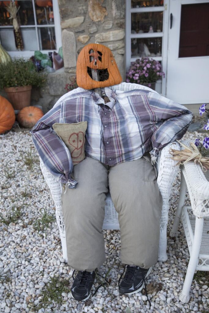 A "pumpkinhead" man, out front for the autumn season at the Maggie Valley Rock Shop, a gem and antiques shop in Maggie Valley, in the Great Smoky Mountain Range of far-western North Carolina