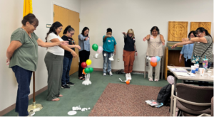 Workshop participants conduct the "Touchdown" activity, simulating insertion of a rover into an unknown environment. Courtesy of NASA Science Editorial Team.