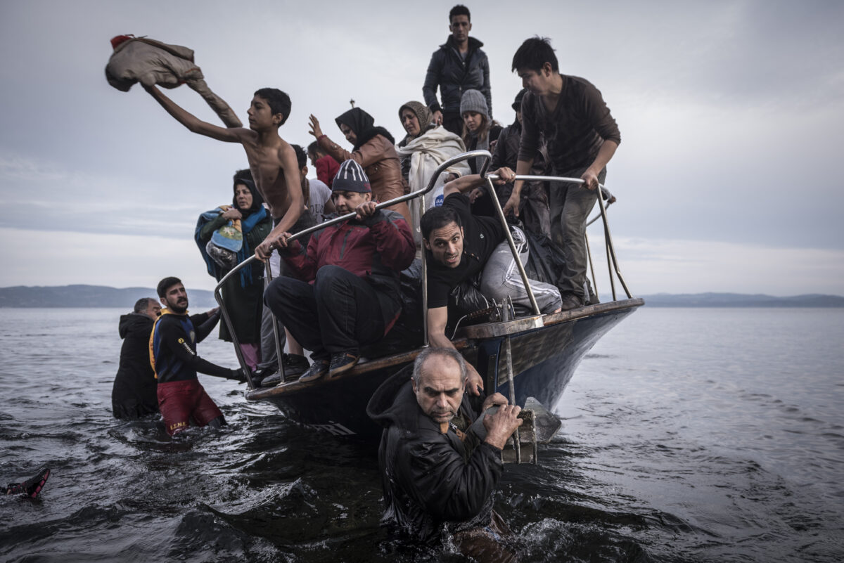 Photo of a group of migrants arriving at by boat at the Greek Island of Lesbos in 2015. Photo by Sergey Ponomarev, The New York Times, 2016 Breaking News Photography. Courtesy of The New York Times via The Pulitzer Prizes