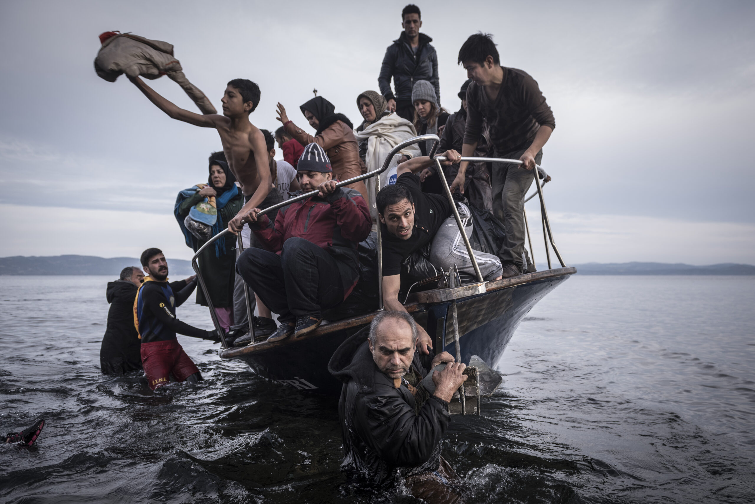 Photo of a group of migrants arriving at by boat at the Greek Island of Lesbos in 2015. Photo by Sergey Ponomarev, The New York Times, 2016 Breaking News Photography. Courtesy of The New York Times via The Pulitzer Prizes